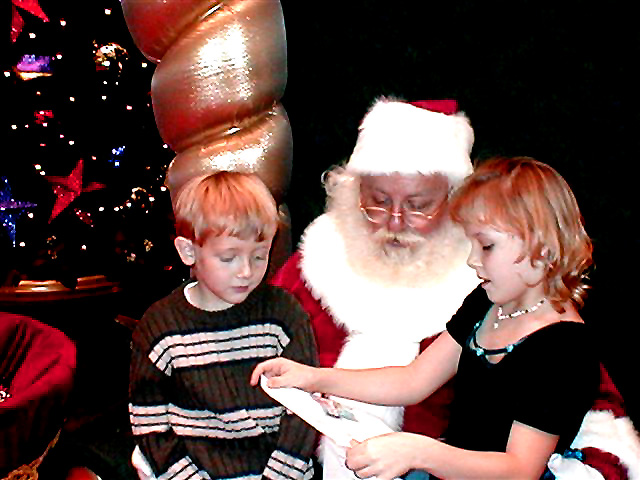 Amanda giving Santa her Christmas List